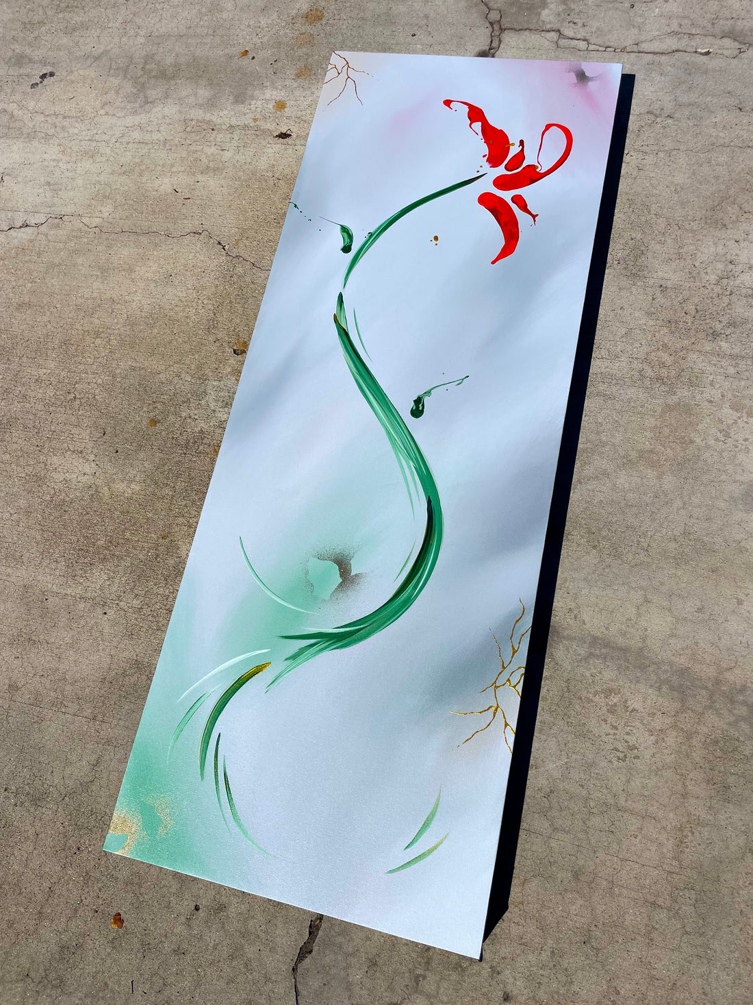 The Rose That Grew From Concrete is an homage to Tupac painting by Michael Carini of Carini Arts