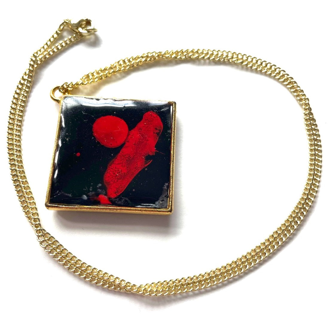 jewelry art made from recycled paint palettes