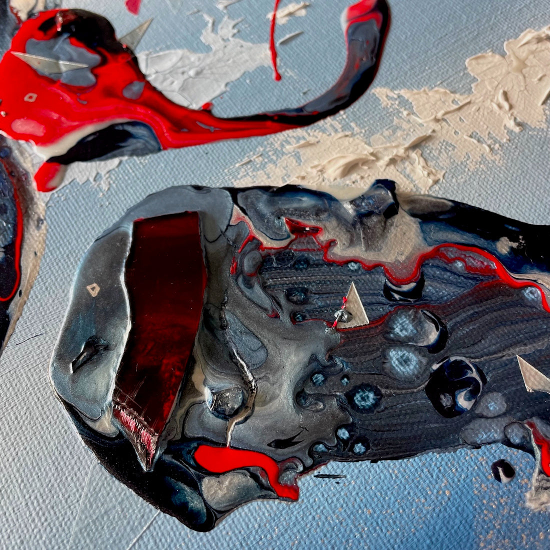 beautiful abstract art incorporating broken glass and car wreckage from an auto accident