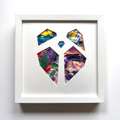 Michael Carini puzzled hearts are created from recycled paint palettes. Palette art you can touch.