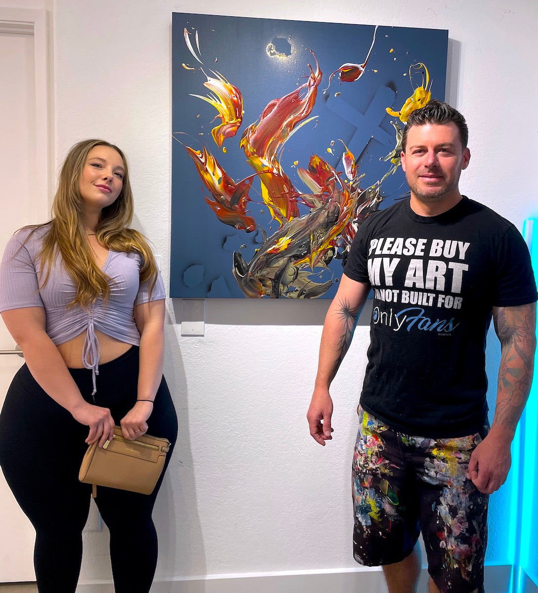 Michael Carini with Instagram model Colors of Autumn for an art opening highlighting Carini's work on exhibit at an art gallery in La Jolla, CA.